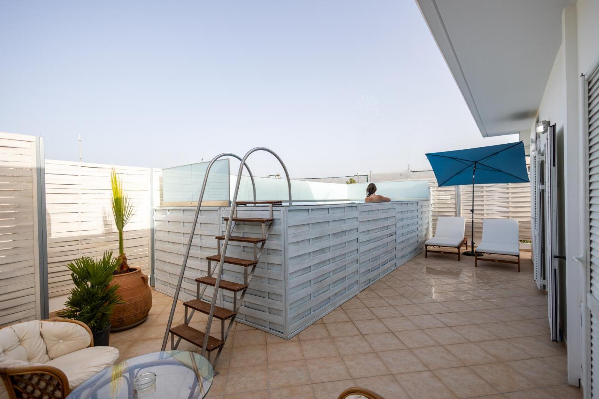 With Heated Rooftop Pool